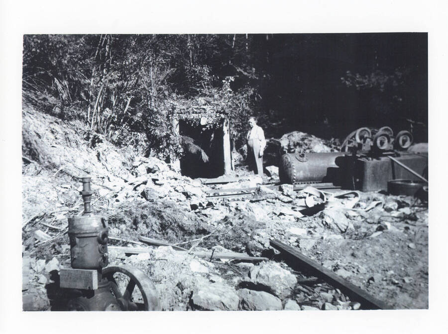 Man in front of the entrance to the Gold Hill Mine.