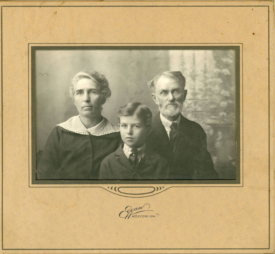 Portrait photograph of George G. and Lettie Strong with son Russell.