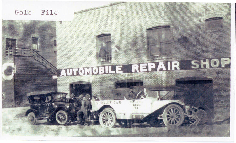 Cars sit outside of the automobile repair shop at the Potlatch Mercantile.