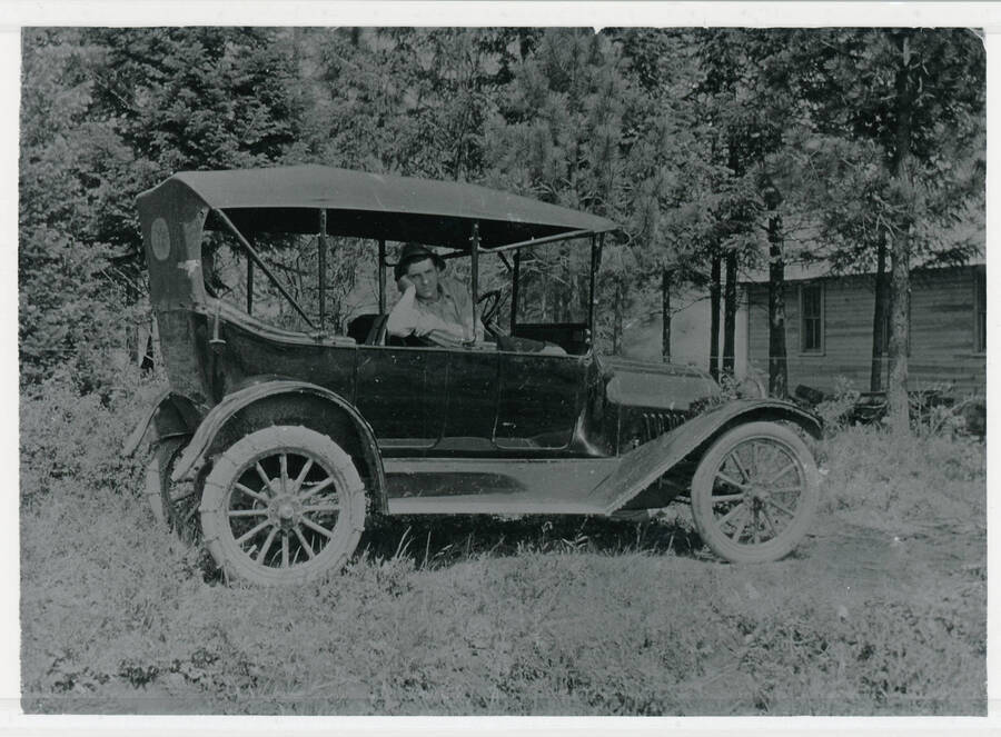Durell Nirk in his first car, a 1916 Chevrolet.