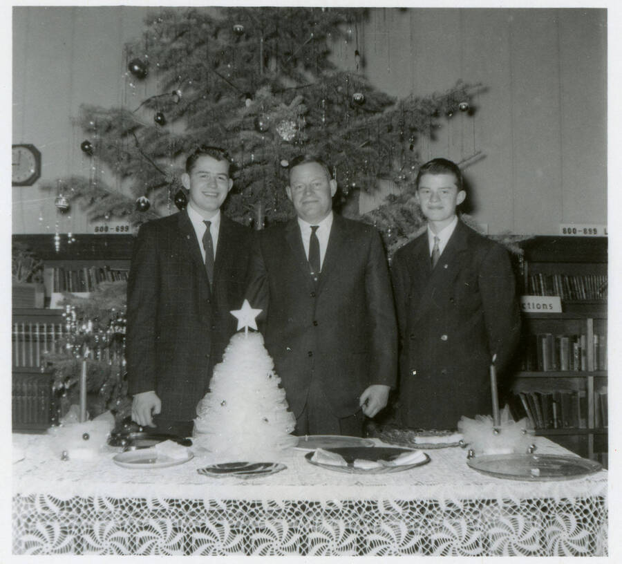 Photograph of Dwight Strong with Allen and Gary at the Masque and Dagger initiation in 1959 at Potlatch High School.