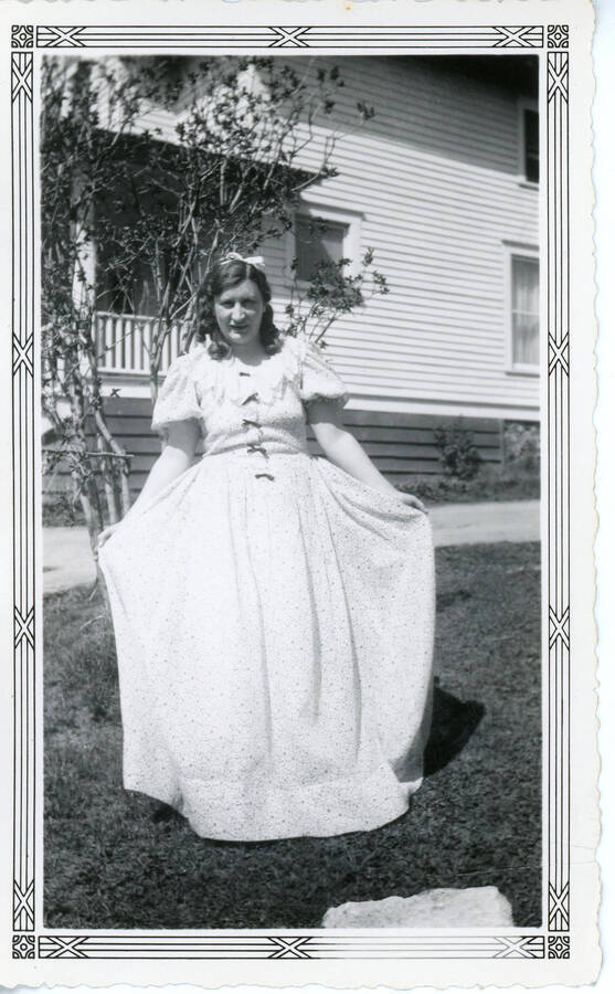 Photograph of Josephine Alexander in her Madrigal Singers dress at the Union Church.
