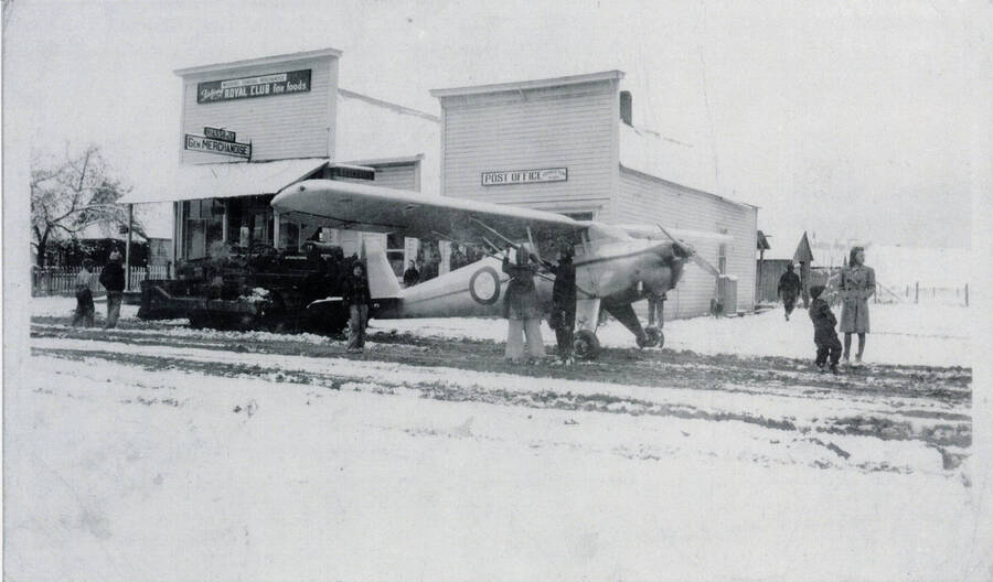 Photograph of a Civil Air Patrol plane making an emergency landing on Princeton Main Street in the 1904s.