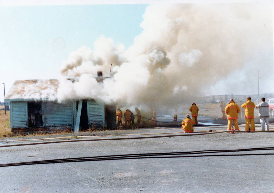 Photograph of burning buildings at the Potlatch mill.