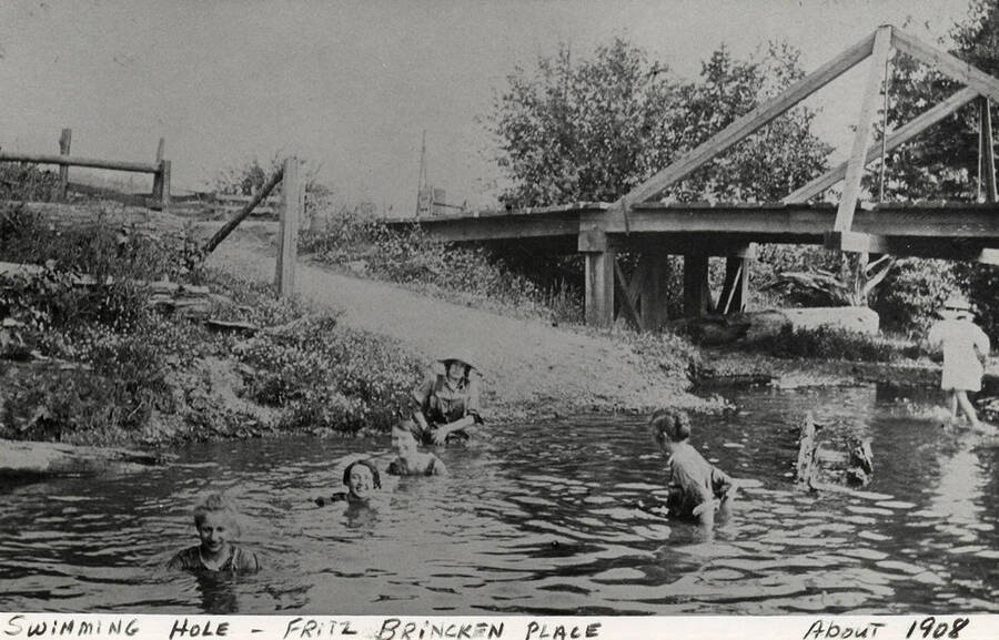 People in a swimming hole at the Fritz Brincken Place. Photograph taken around 1908.