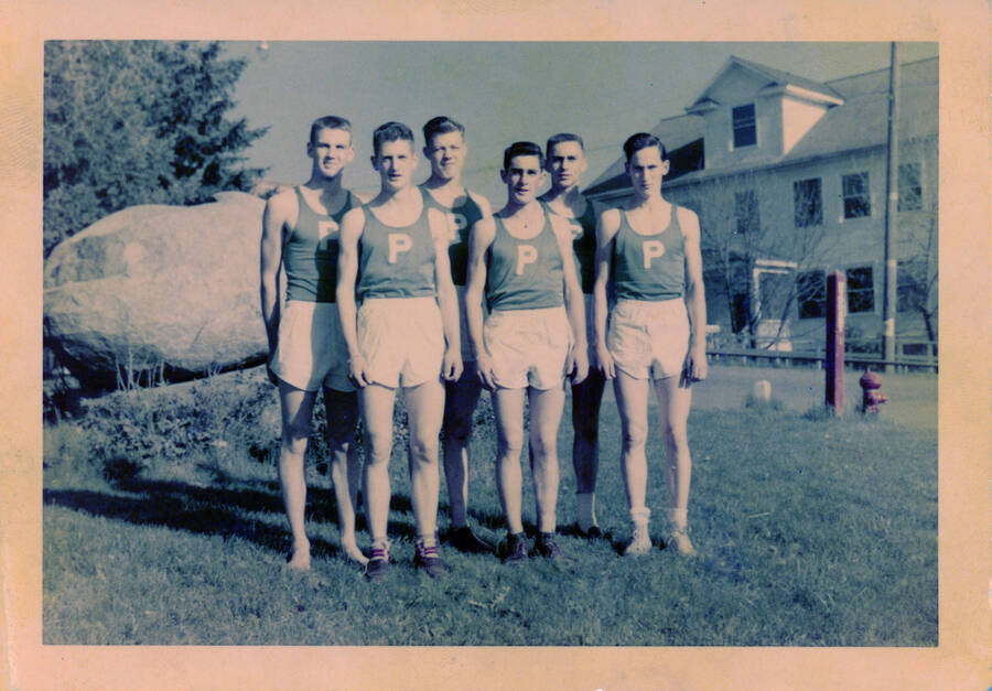 Photograph of the basketball team at Potlatch High School. (left to right) Ted Runberg, Geroge Boyd, Bumpy Land\g, Don Katzenberger, Buzz Hanson, and Luther Fitch.