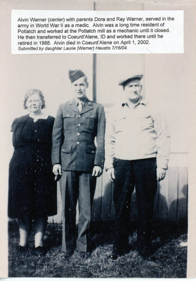 Photograph of Alvin Warner with his parents.