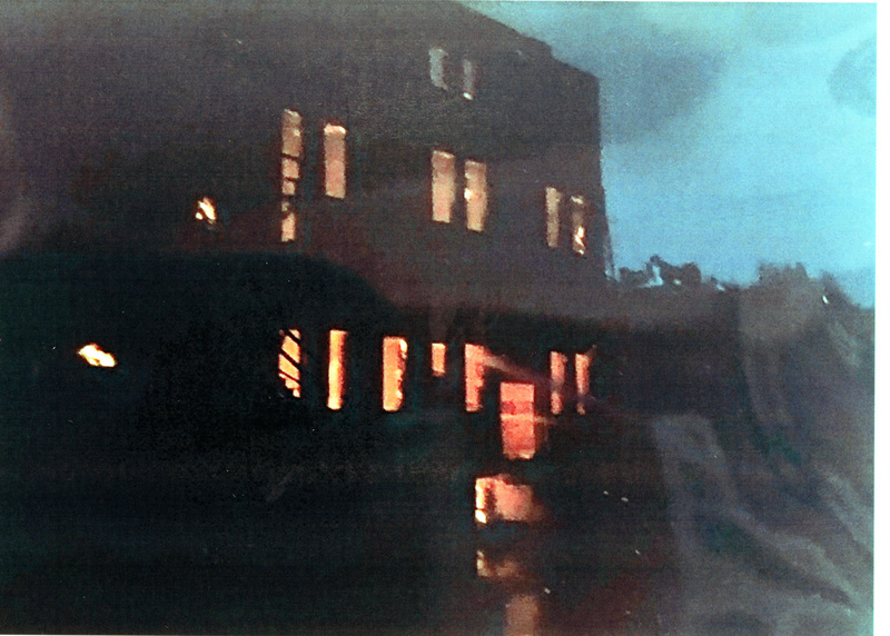 Photograph of the Potlatch Mercantile on fire.