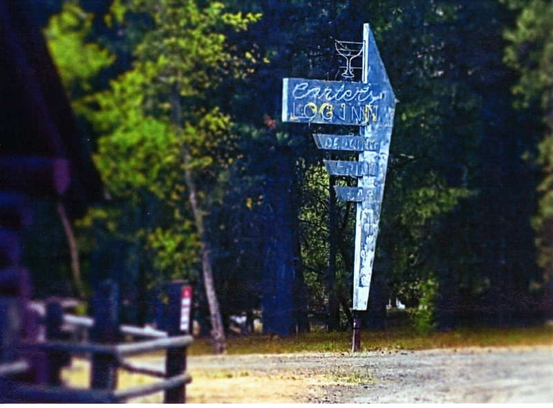 Photograph of the Carter's Log Inn sign during restoration.