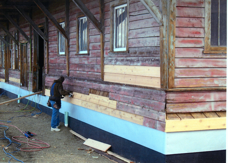 Photograph of replacement of siding on the WI&M Depot.