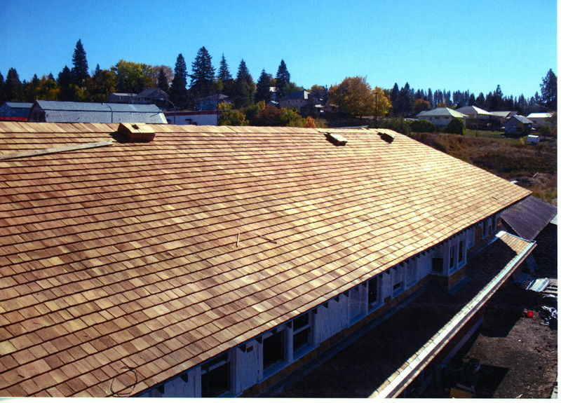 Photograph of the roof replacement near completion on the WI&M Depot.
