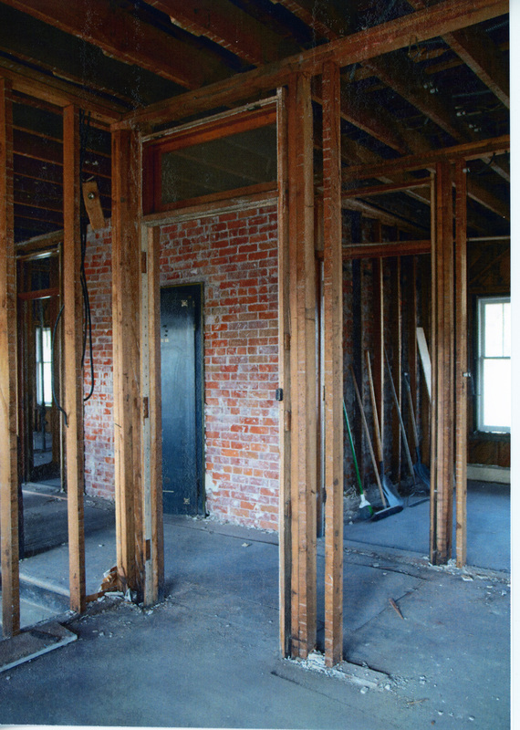 Photograph of framing for the offices on the 2nd floor hallway at the WI&M Depot.