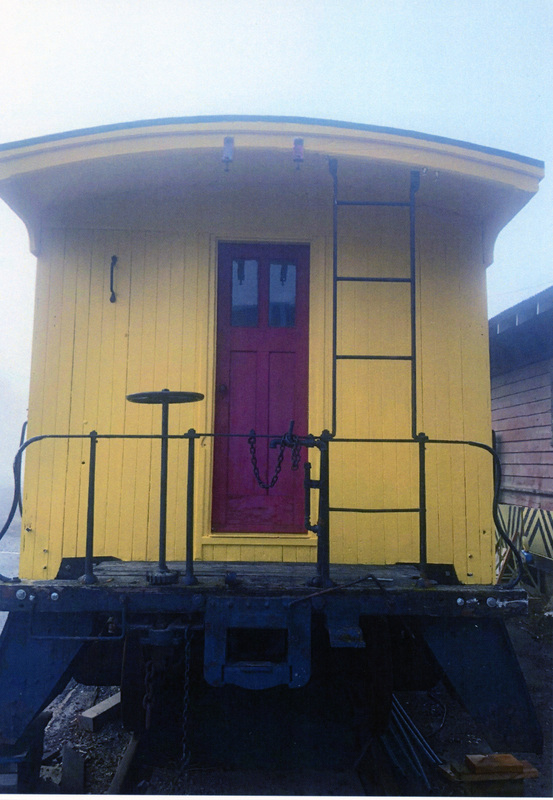 Photograph of the painting detail of the restored Caboose X-5.
