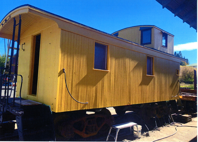 Photograph of the painting detail of the restored Caboose X-5.