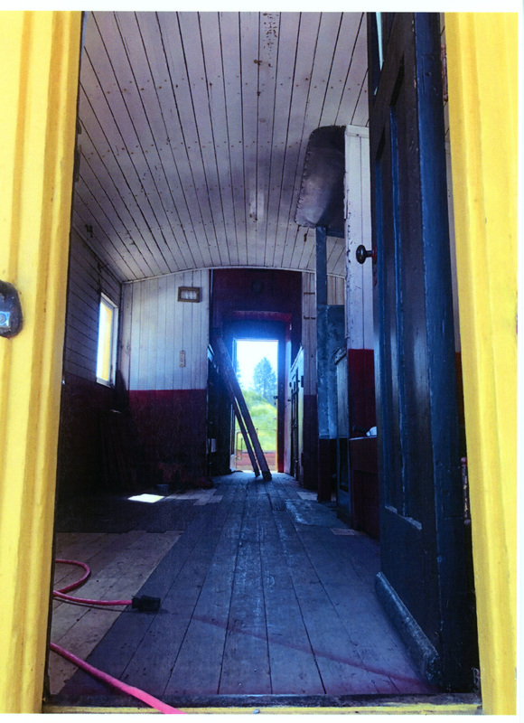 Photograph of the interior of the Caboose X-5 prior to restoration.