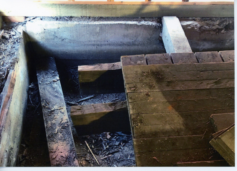 Photograph of restoring the fouundation and floor of the WI&M Annex.