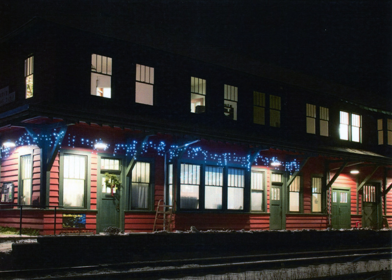 Photograph of the WI&M Depot at night.