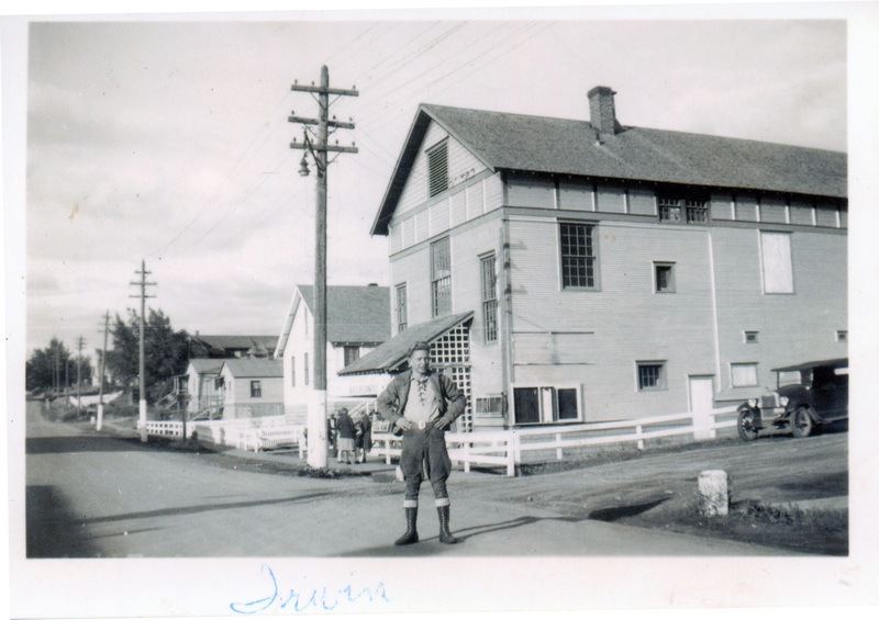 Photograph of Irwin Minden in front of the Potlatch Theater.