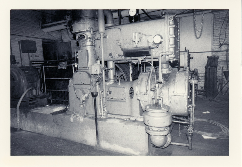 Photograph of the one of three compressors in the power plant at the Potlatch Mill.