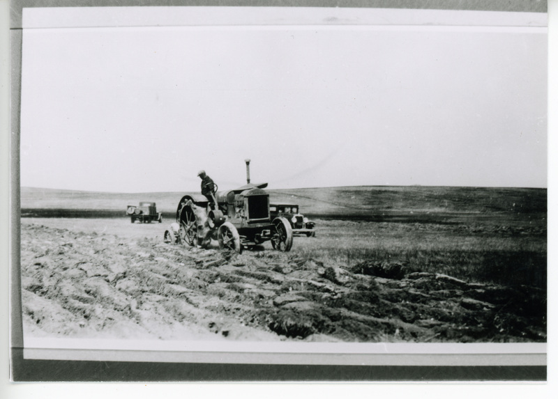 Photograph of Herb Paroz on his tractor.
