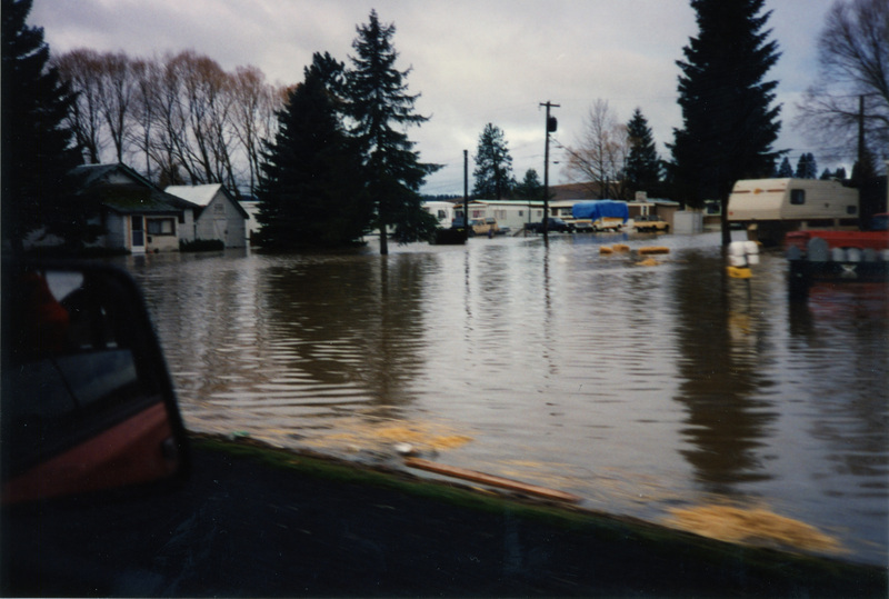 Photograph of a flood around Potlatch.