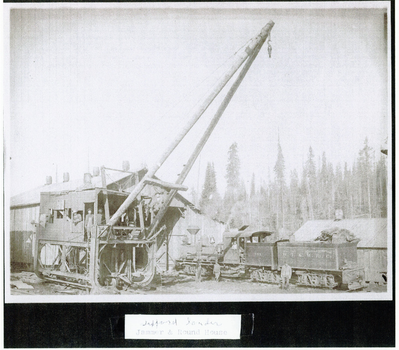 Photograph of a Gifford loader with a WI&M Railway train.