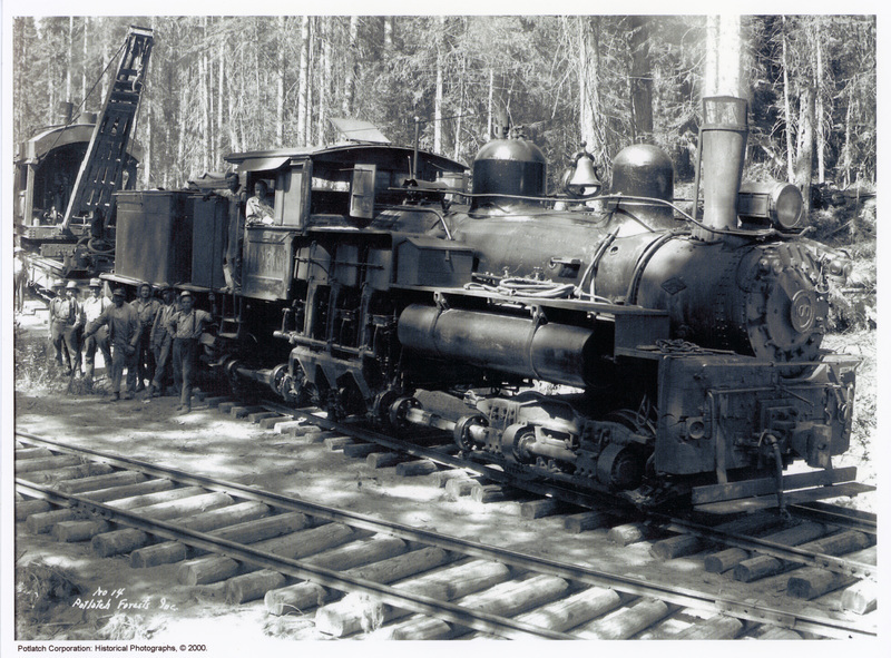 Photograph of Locomotive #14 with crew and loader.
