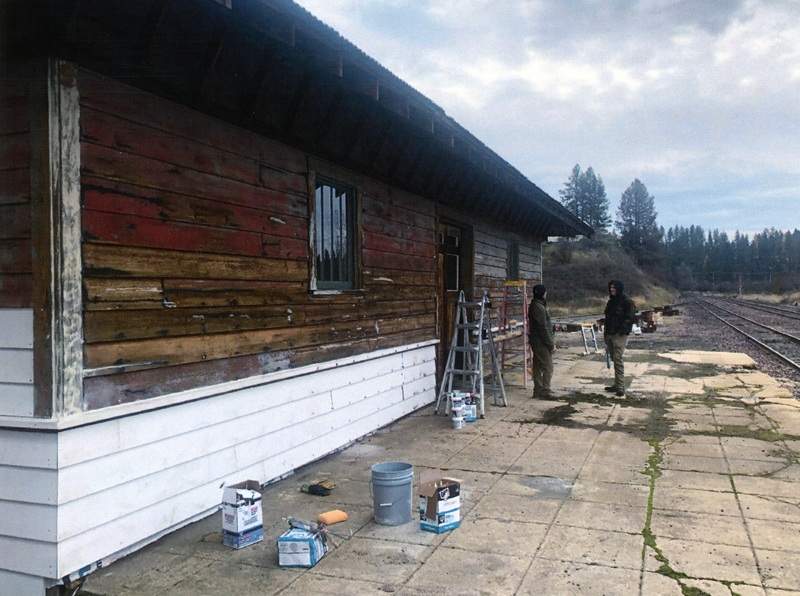 Photograph of men preparing the WI&M Depot Annex for painting.