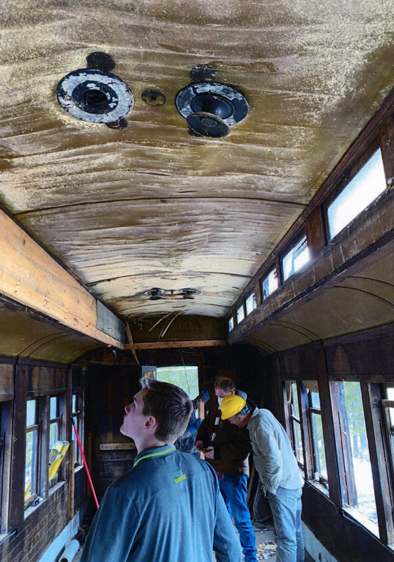 Photograph of the ceiling of passenger car 306 prior to restoration.