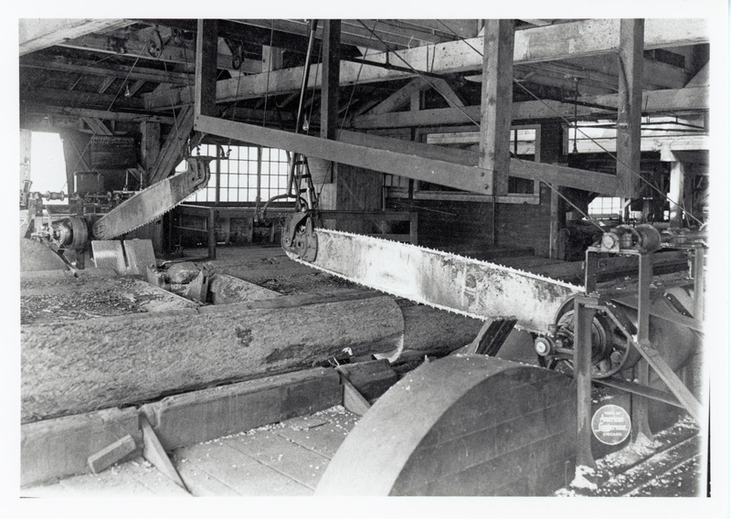Photograph of the steam powered drag saw designed by Potlatch mill manager Mark Seymour. It was used to cut logs into 16 food lengths after they were hauled into the mill. It was the predecessor to the chain saw.