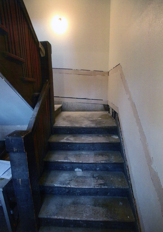 Photograph of the condition of the stairway to the second floor prior to the WI&M Depot restoration.