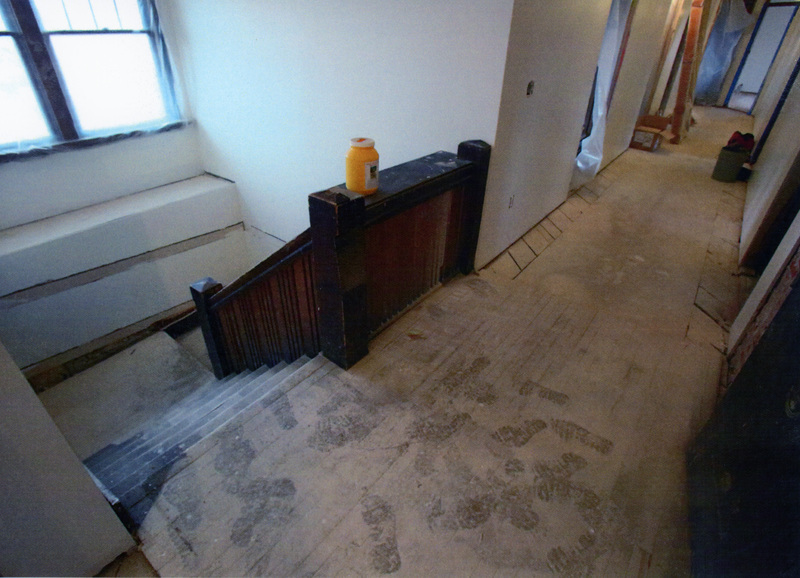 Photograph of the stairway and second floor corridor during restoration of the WI&M Depot.