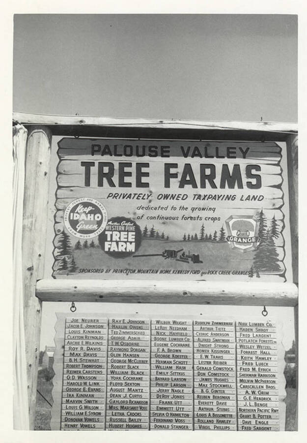 A sign for the Palouse Valley Tree Farms sponsored by Princeton Mountain Home, Kennedy Ford, and Rock Creek Granges.