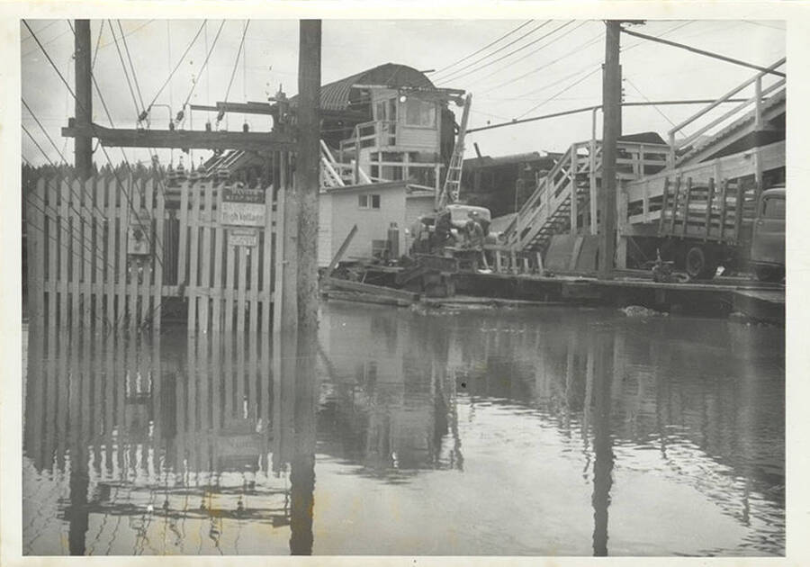 A photograph of the flooded sawmill.