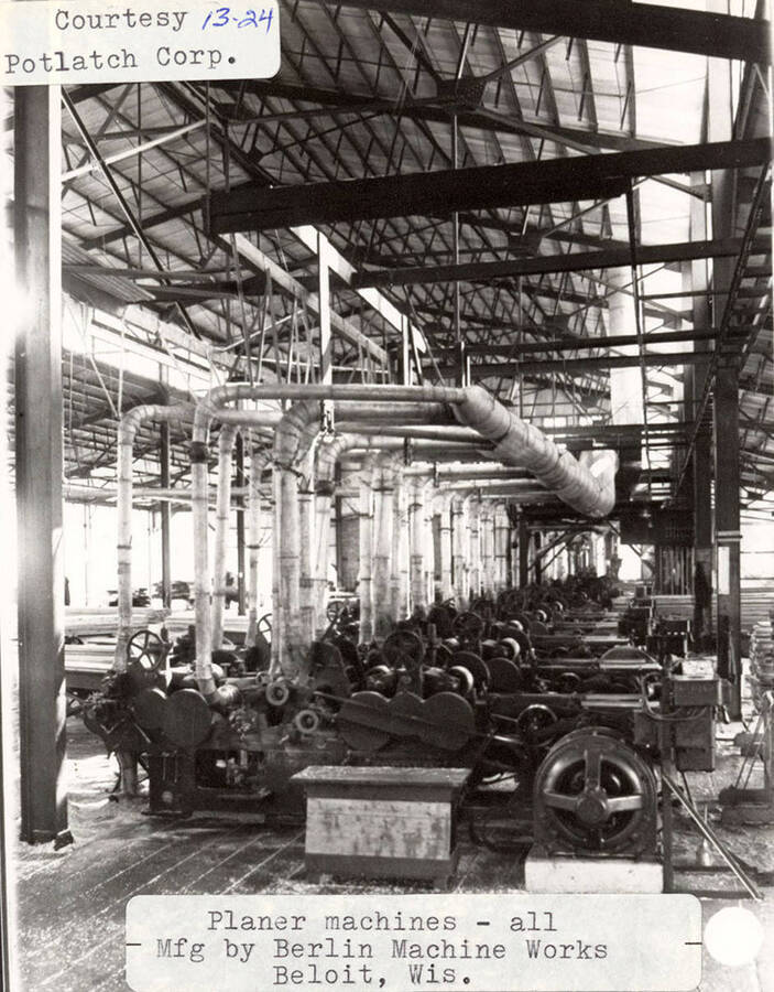 A photograph of planer machines in Elk River that were all manufactured by Berlin Machine Works in Beloit, Wisconsin.