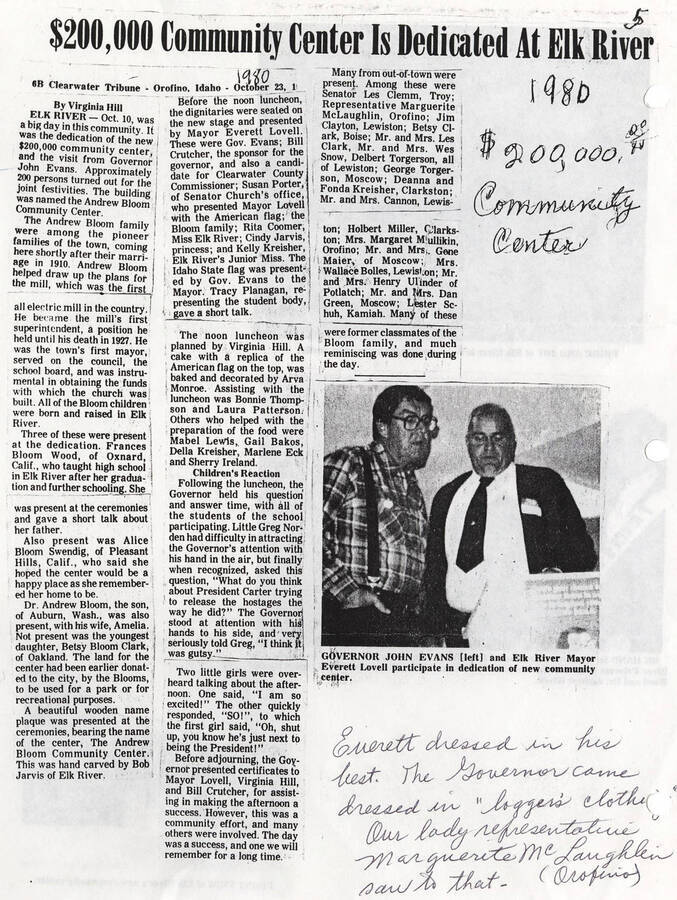 A newspaper article from the Clearwater Tribune in Orofino, Idaho about the $200,000 Community Center dedicated to Elk River. The article mentions appearances by Governor John Evans, the Andrew Bloom pioneering family, Mayor Everett Lovell, the governor sponsor and Clearwater County Commissioner candidate Bill Crutcher, Miss Elk River Rita Coomer, Mayor Tracy Planagan, and others. The luncheon was followed by a question and answer period with the students from a participating school. Several awards and certificates were presented at the time.