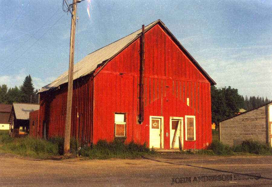 A photograph of the red office building for Potlatch Lumber Company.