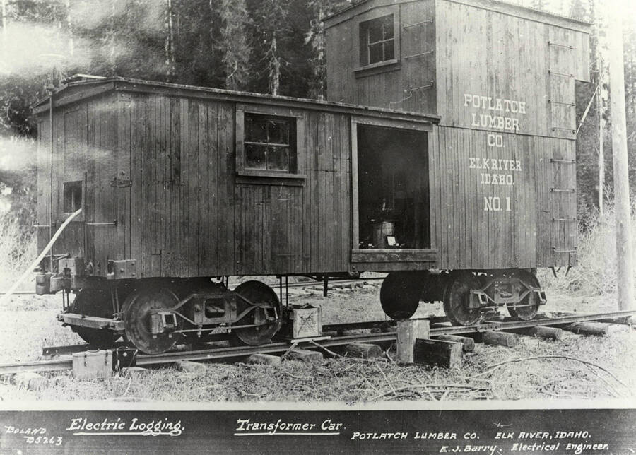 A photograph of a trasformer car used for electric logging designed by electrical engineer E.J. Barry at the Elk River, Idaho Camp for the Potlatch Lumber Company.