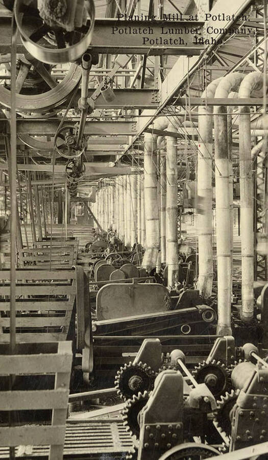 A photograph of the interior of the planing mill at Potlatch.