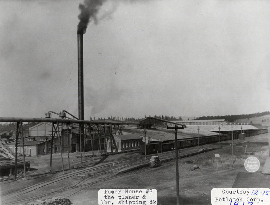 A photograph of the power house #2, the planer and lumber, and the shipping dock at the Potlatch Lumber Company