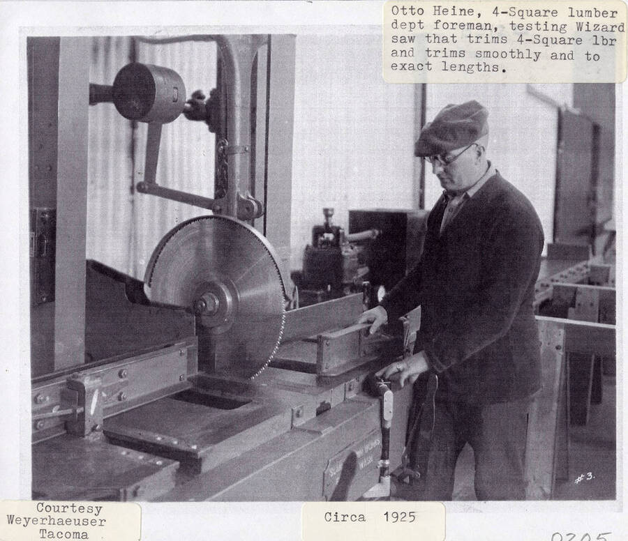 A photograph of the 4-Square lumber department foreman Otto Heine testing Wizard saw that trims 4-Square lumber and trims smoothly and to exact lengths.