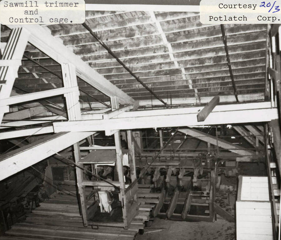 A photograph of the sawmill trimmer and control cage.