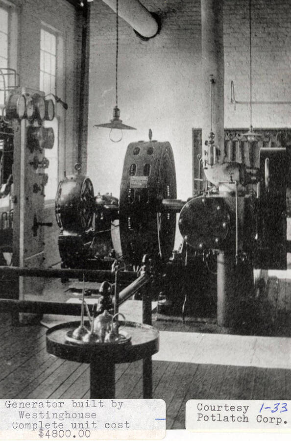 A photograph of a generator built by Westinghouse that cost $4800.00 to complete.