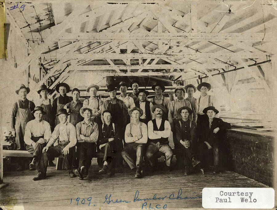 A photograph of the green lumber chain crew courtesy of Paul Welo.