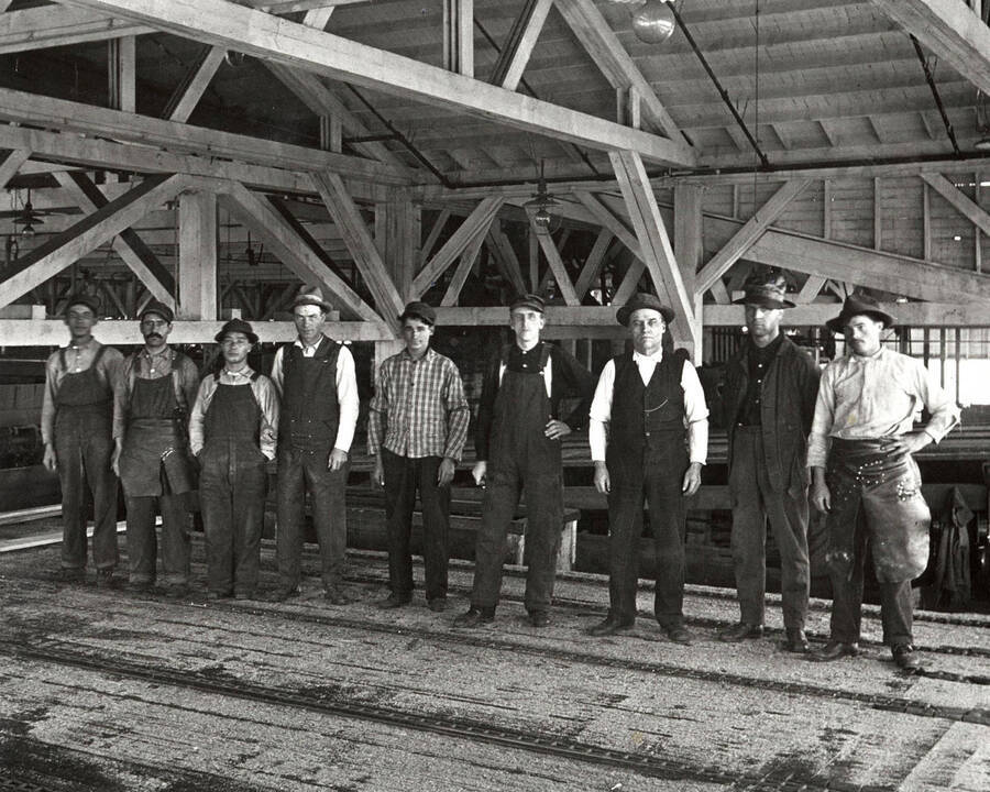 A photograph of workers at the Potlatch sawmill.