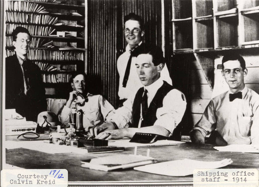 A photograph of the shipping office staff.