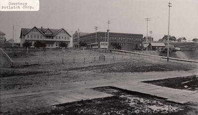 A photograph of the Potlatch hotel and the Potlatch Mercantile Company.