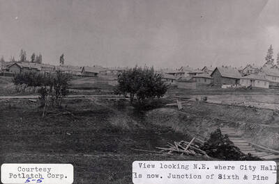 A photograph looking northeast by the junction of Sixth and Pine where City Hall (old Potlatch Lumber Company Main Office) is located.