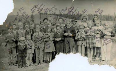 Children of Rock Creek Bible School with their bibles. Names on photo