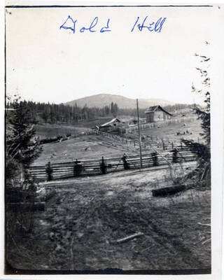 Looking out at Gold Hill. Farm buildings visible in middle ground.